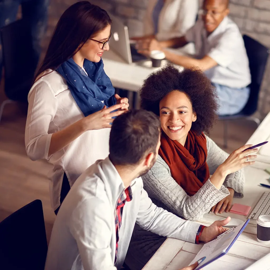 Team of professionals collaborating and sharing ideas during a business meeting in Harris County